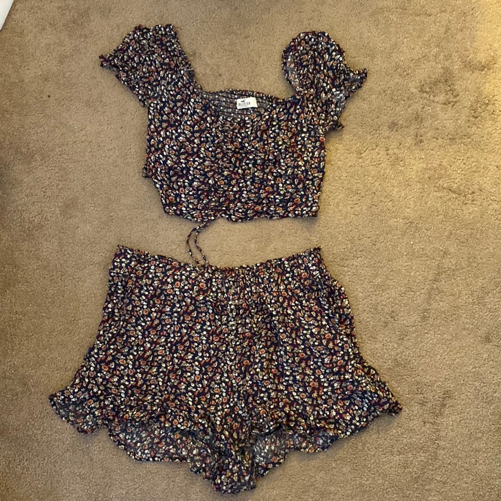 Hollister set. Navy blue with cute floral pattern. Top size M bottoms Size L